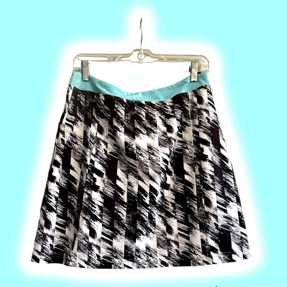 Bette & Court - golf skort and sleeveless zip front top
